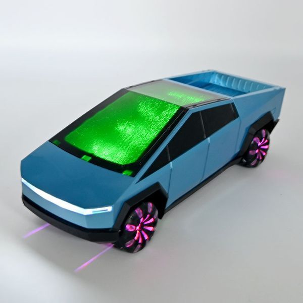 Радіокерована іграшкова машинка Tesla Cybertruc OKL 001-1 з роликовими колесами та зарядною станцією 193806 фото &mdash; Кузя