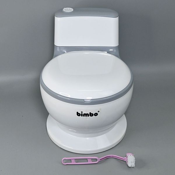 Детский горшок-унитаз BIMBO 2219-50 с мягким сиденьем, звуковым эффектом и щеткой 191968 фото &mdash; Кузя